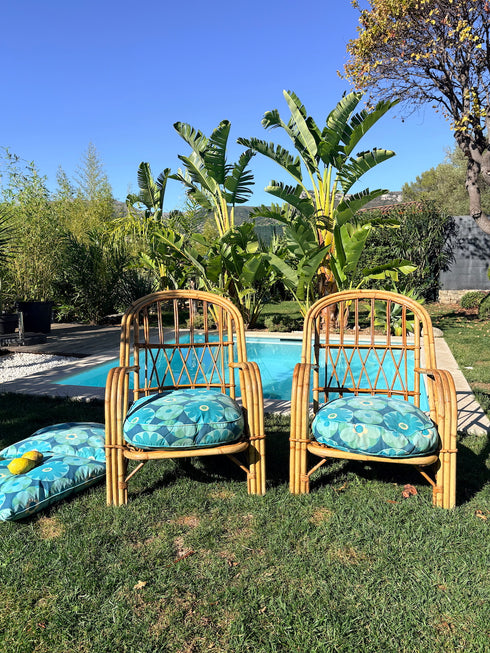 Paire de fauteuils en rotin "AUDOUX MINNET"