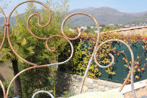 Banquette ancienne en fer forgé "Pâquerette"